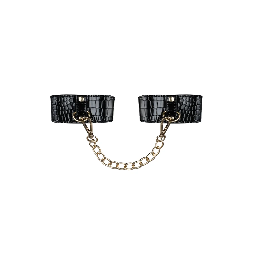 Handfesseln in Schwarz mit goldfarbener Kette von Obsessive